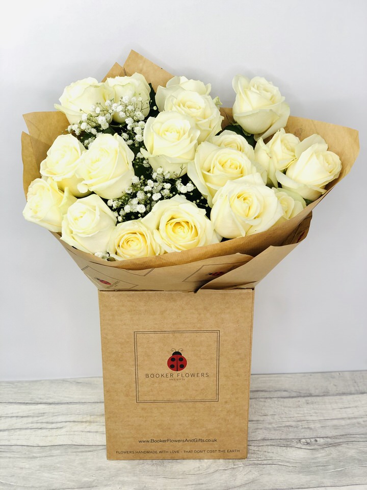 <h2>Eighteen White Roses - Handtied Bouquet</h2>
<br>
<ul>
<li>Approximate Dimensions: 55cm x 40cm</li>
<li>Flowers arranged by hand and gift wrapped in our signature eco-friendly packaging and finished off with a hidden wooden ladybird</li>
<li>To give you the best occasionally we may make substitutes</li>
<li>Our flowers backed by our 7 days freshness guarantee</li>
<li>For delivery area coverage see below</li>
</ul>
<br>
<h2>Flower Delivery Coverage</h2>
<p>Our shop delivers flowers to the following Liverpool postcodes L1 L2 L3 L4 L5 L6 L7 L8 L11 L12 L13 L14 L15 L16 L17 L18 L19 L24 L25 L26 L27 L36 L70 If your order is for an area outside of these we can organise delivery for you through our network of florists. We will ask them to make as close as possible to the image but because of the difference in stock and sundry items it may not be exact.</p>
<br>
<h2>Hand-tied Bouquet | 18 White Roses</h2>
<p>These beautiful roses hand-arranged by our professional florists into a hand-tied bouquet are a delightful choice. This bouquet of 18 white roses would make the perfect gift or to celebrate an Anniversary.</p>
<p>Handtied bouquets are a lovely display of fresh flowers that have the wow factor. The advantage of having a bouquet made this way is that they are artfully arranged by our florists and tied so that they stay in the display.</p>
<p>They are then gift wrapped and aqua packed in a water bubble so that at no point are the flowers out of water. This means they look their very best on the day they arrive and continue to delight for days after.</p>
<p>Being delivered in a transporter box and in water means the recipient does not need to put the flowers in a vase straight away they can just put them down and enjoy.</p>
<p>Featuring 18 large-headed white roses together with mixed seasonal foliages.</p>
<br>
<h2>Eco-Friendly Liverpool Florists</h2>
<p>As florists we feel very close earth and want to protect it. Plastic waste is a huge problem in the florist industry so we made the decision to make our packaging eco-friendly.</p>
<p>To achieve this we worked with our packaging supplier to remove the lamination off our boxes and wrap the tops in an Eco Flowerwrap which means it easily compostable or can be fully recycled.</p>
<p>Once you have finished enjoying your flowers from us they will go back into growing more flowers! Only a small amount of plastic is used as a water bubble and this is biodegradable.</p>
<p>Even the sachet of flower food included with your bouquet is compostable.</p>
<p>All our bouquets have small wooden ladybird hidden amongst them so do not forget to spot the ladybird and post a picture on our social media pages to enter our rolling competition.</p>
<br>
<h2>Flowers Guaranteed for 7 Days</h2>
<p>Our 7-day freshness guarantee should give you confidence that we will only send out good quality flowers.</p>
<p>Leave it in our hands we will create a marvellous bouquet which will not only look good on arrival but will continue to delight as the flowers bloom.</p>
<br>
<h2>Liverpool Flower Delivery</h2>
<p>We are open 7 days a week and offer advanced booking flower delivery same-day flower delivery 3-hour flower delivery. Guaranteed AM PM or Evening Flower Delivery and also offer Sunday Flower Delivery.</p>
<p>Our florists deliver in Liverpool and can provide flowers for you in Liverpool Merseyside. And through our network of florists can organise flower deliveries for you nationwide.</p>
<br>
<h2>The Best Florist in Liverpool your local Liverpool Flower Shop</h2>
<p>Come to Booker Flowers and Gifts Liverpool for your beautiful flowers and plants. For that bit of extra luxury we also offer a lovely range of finishing touches such as wines champagne locally crafted Gin and Rum Vases Scented Candles and Chocolates that can be delivered with your flowers.</p>
<p>To see the full range see our extras section.</p>
<p>You can trust Booker Flowers and Gifts of delivery the very best for you.</p>
<p><br /><br /></p>
<p><em>5 Star review on Yell.com</em></p>
<br>
<p><em>Thank you Gemma for your fabulous service. The flowers are of the highest quality and delivered with a warm smile. My sister was delighted. Ordering was simple and the communications were top-notch. I will definitely use your services again.</em></p>
